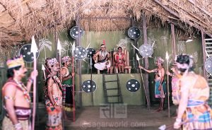 Nishadraj and his wife sitted on the throne 